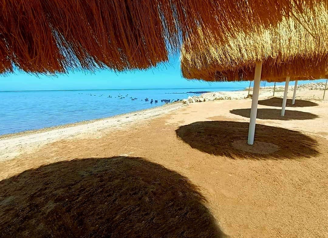 Shaded beach seating at Premier Beach resort Hurghada